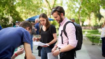 Attendees making notes
